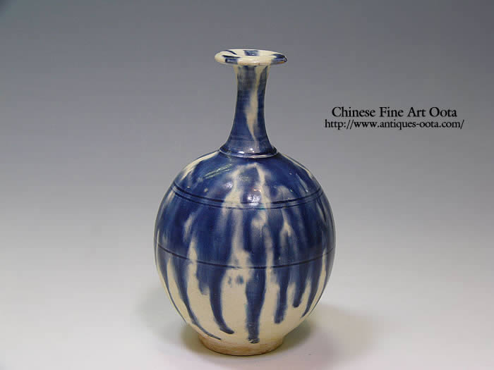 An extremely rare blue-splashed sancai-glazed 'lady and